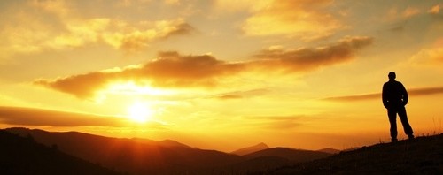 man silhouette on sunset